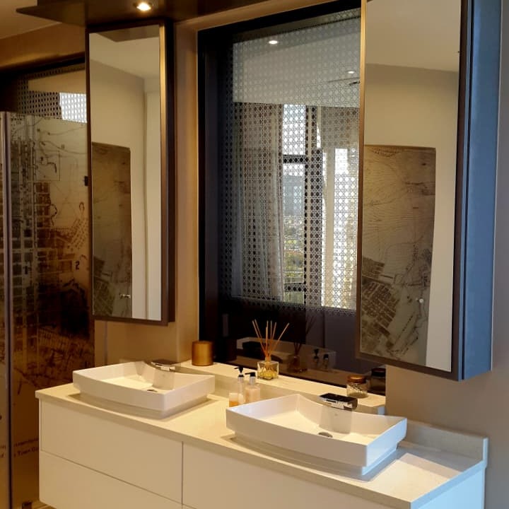 Bathroom with custom vanity and mirror cabinet