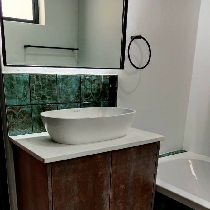 Bathroom vanity with vessel basin